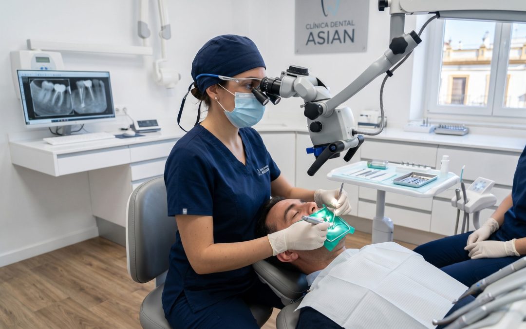 Odontólogo realizando una endodoncia en Sevilla en una clínica dental moderna.